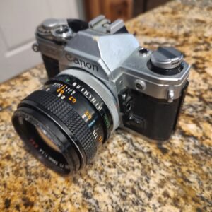 Canon AE-1 35mm SLR Film Camera Kit Silver Black w/ Lenses Bag Untested